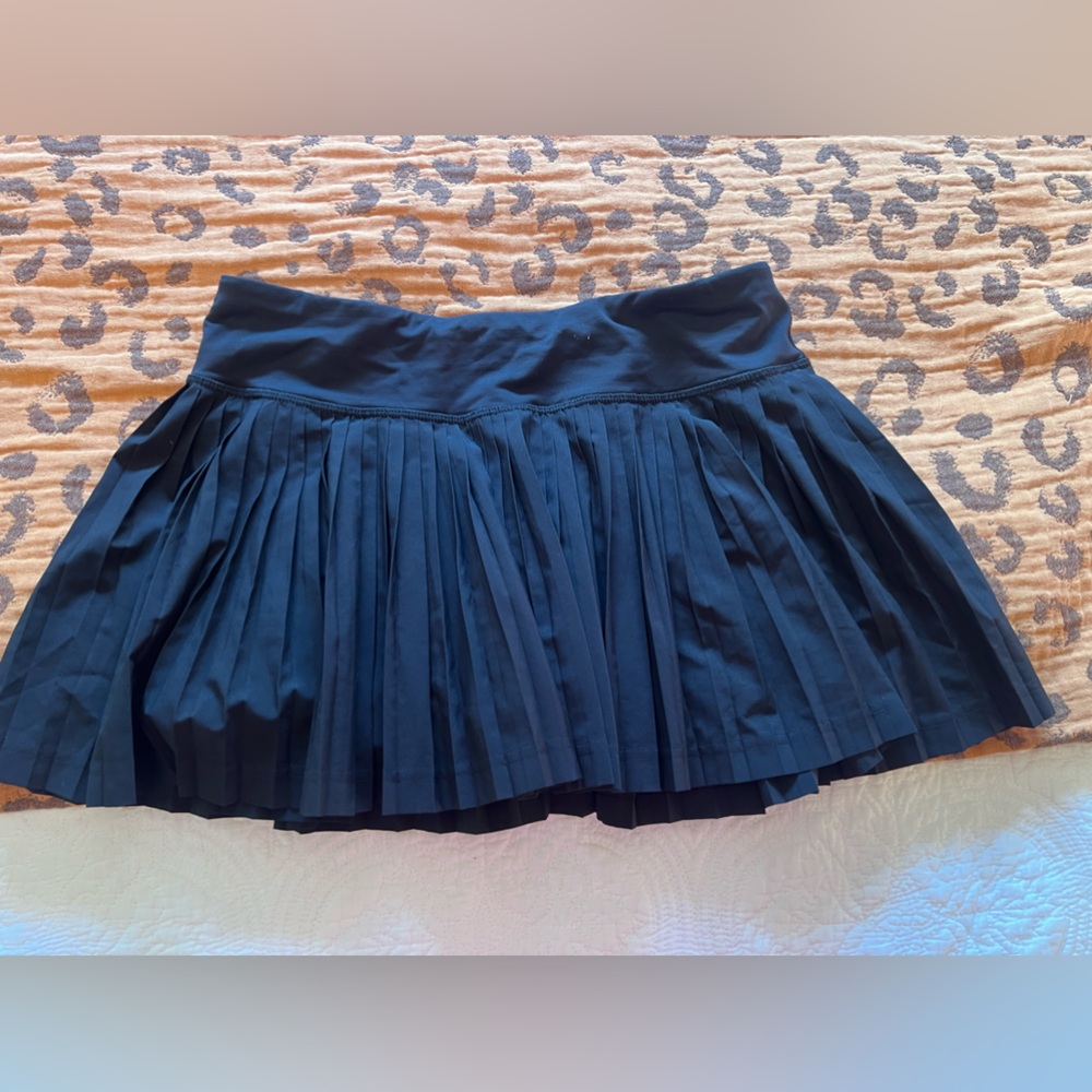 Lululemon pleated skirt. Mid rise with built in shorts